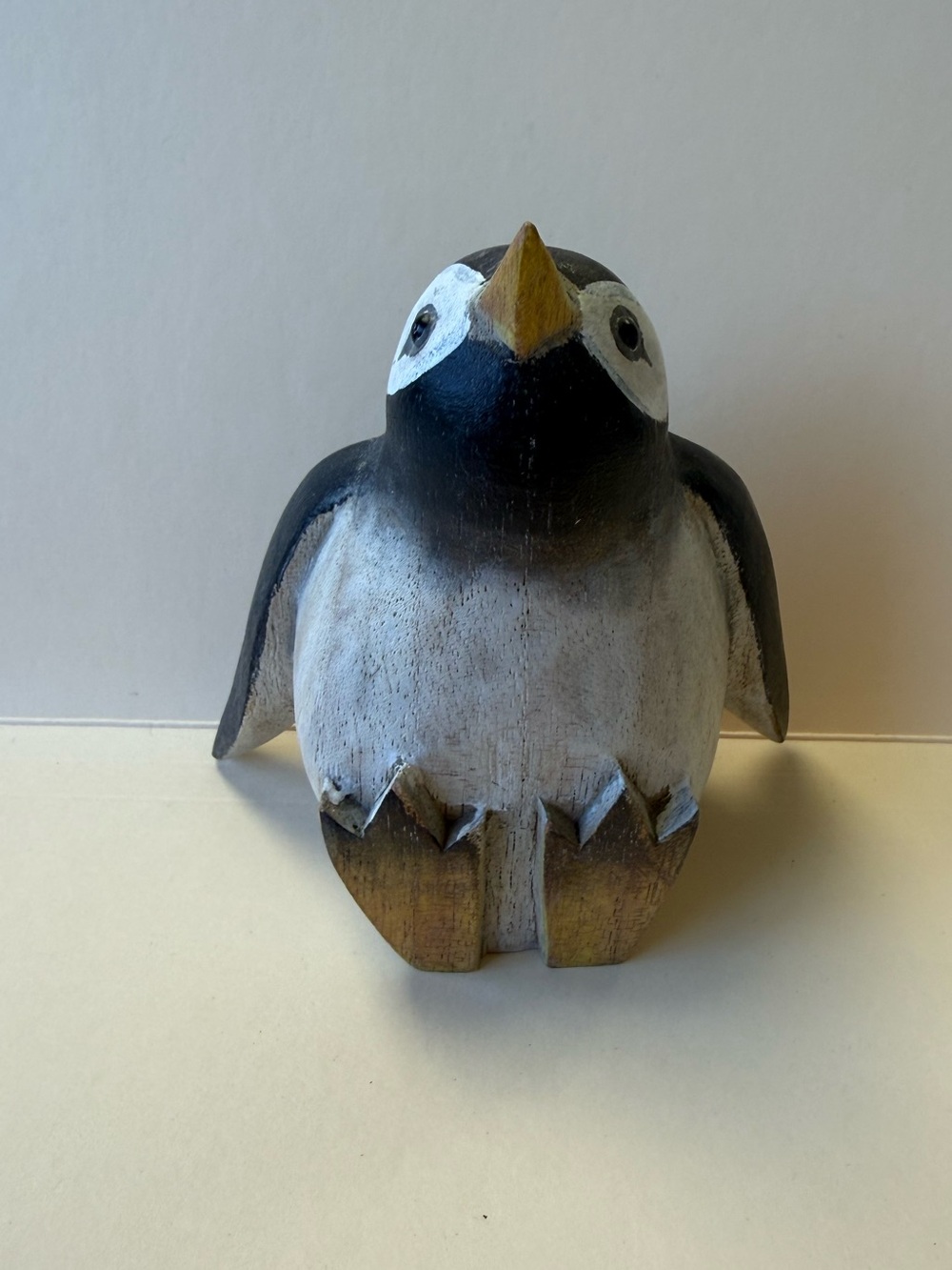 Hand-carved Hand-painted Round Body Wood Penguin Figurine with Yellow Beak.